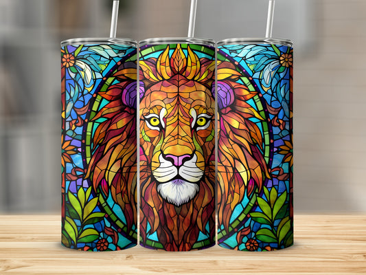 Stained glass lion design on three tumblers with straws.