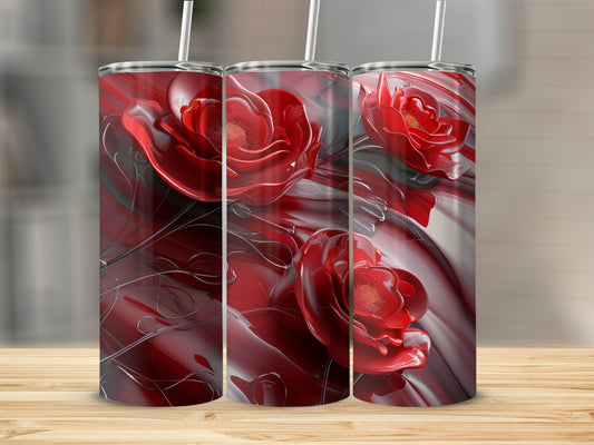 Three red rose tumblers with swirling dark designs on a wooden surface.