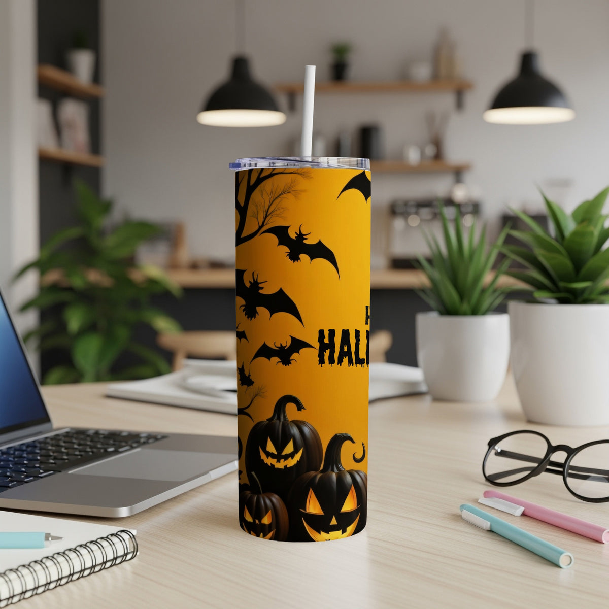 Orange tumbler with bats, pumpkins, and "Happy Halloween" text.