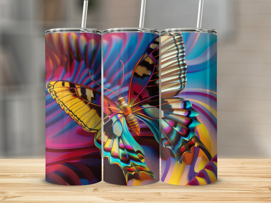 Colorful butterfly tumbler with abstract background on wooden surface.