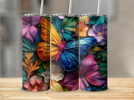 Three tumblers featuring colorful butterflies and floral designs.