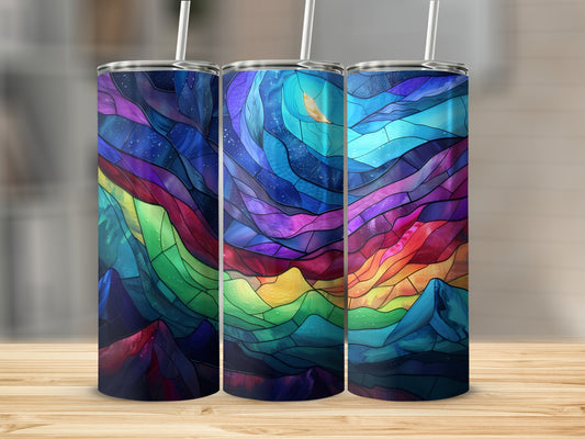 Three tumblers with a stained-glass style celestial landscape design.