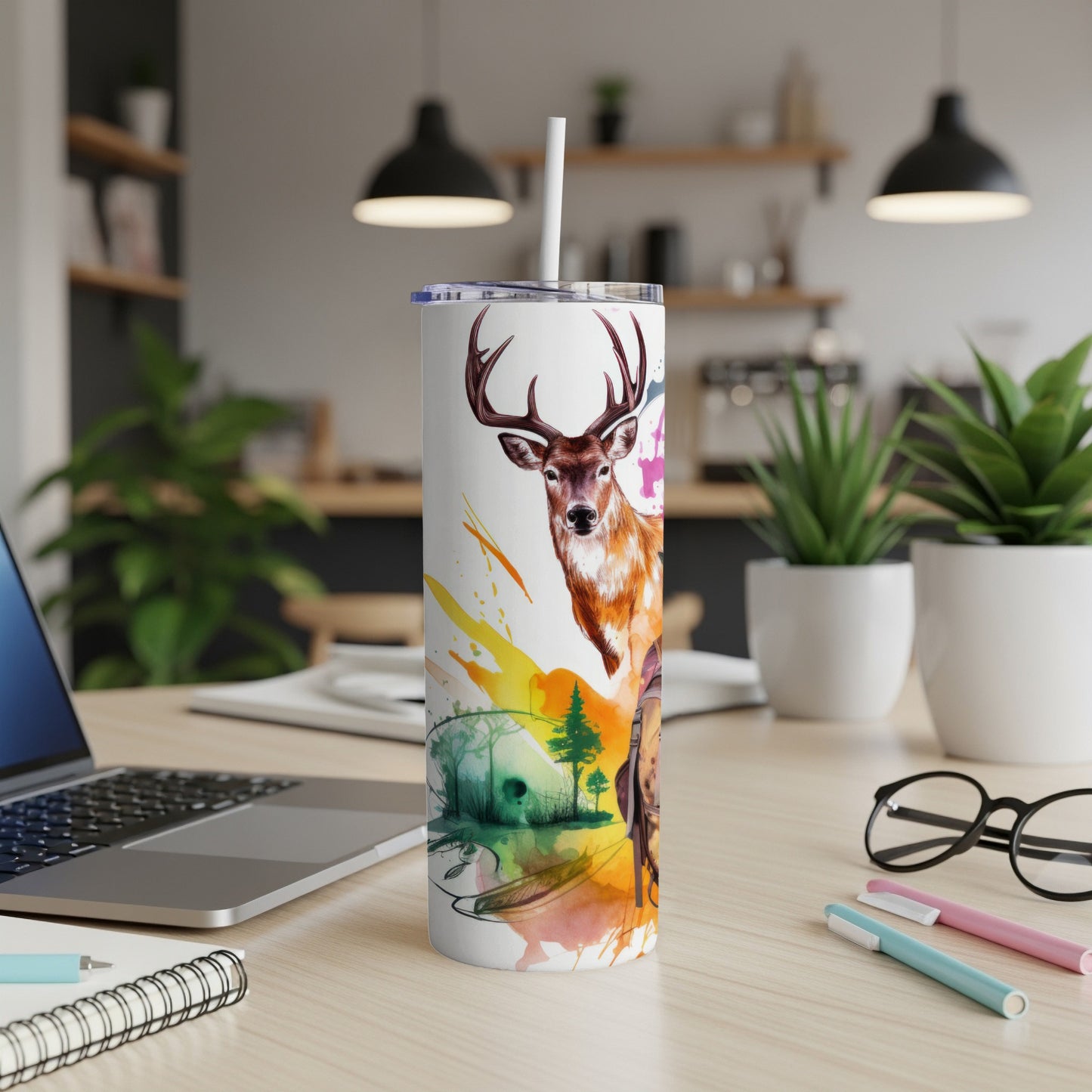 Tumbler with deer and watercolor forest scene.
