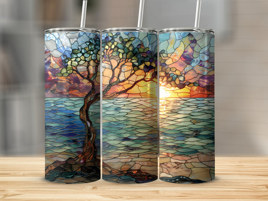 Three tumblers with stained glass tree and sunset ocean design.