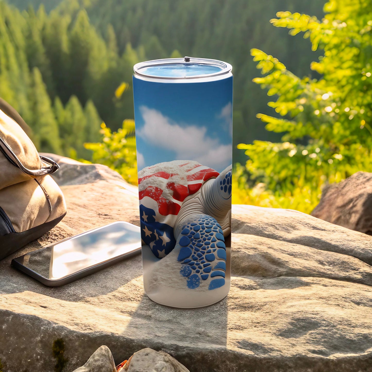 Turtle-themed tumbler with American flag sand design on sandy beach.