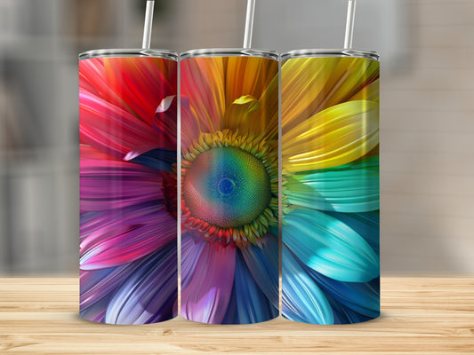 Three tumblers with rainbow floral designs, standing on a wooden surface.