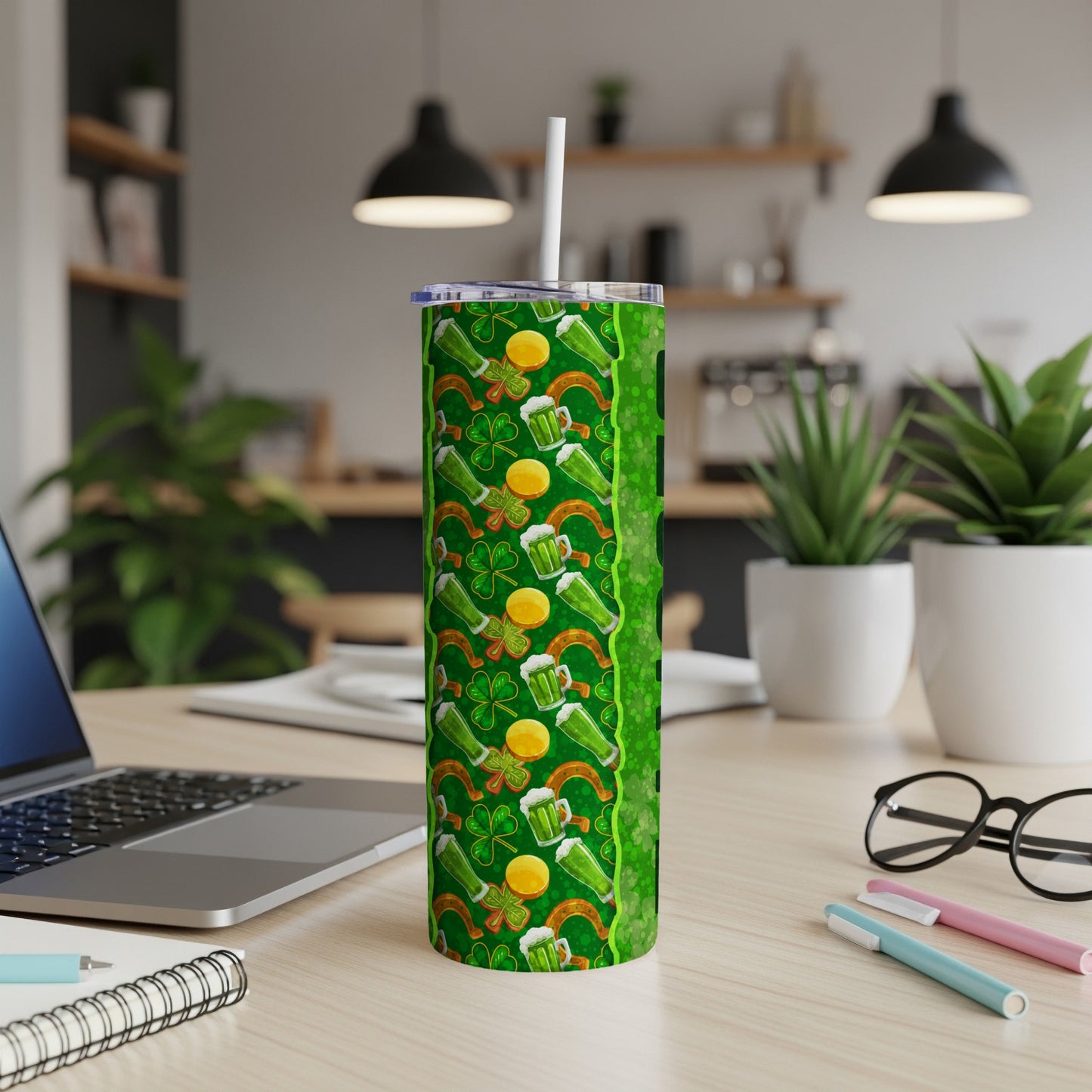 Green tumbler with shamrocks, beer mugs, and horseshoe pattern.