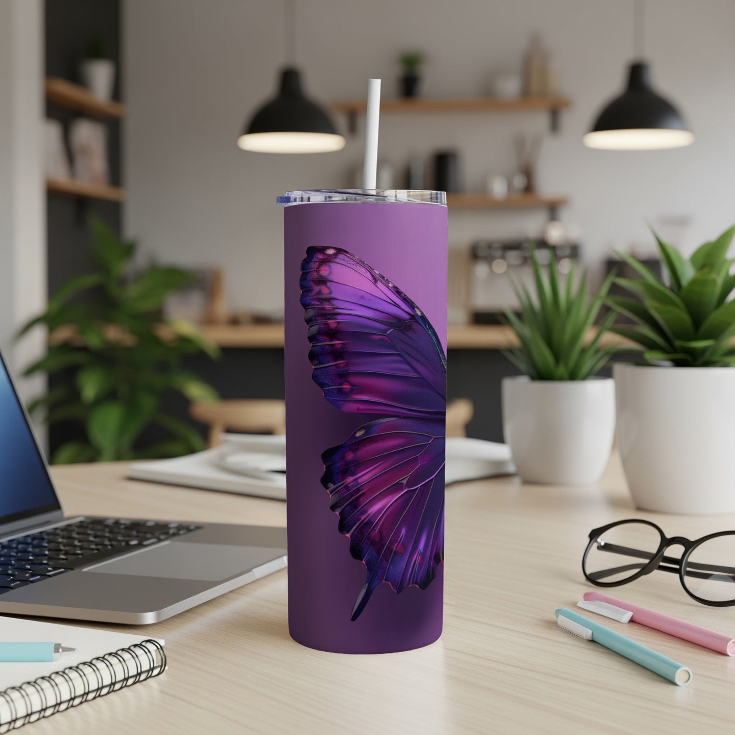 Purple tumbler with large monarch butterfly wing design.