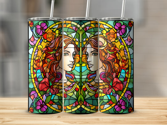 Three stained glass tumblers featuring Gemini zodiac symbol profiles surrounded by floral motifs.