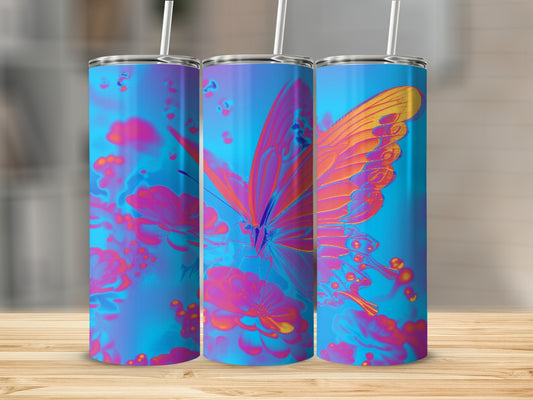 Three tumblers with a neon butterfly and floral design on a wooden surface.