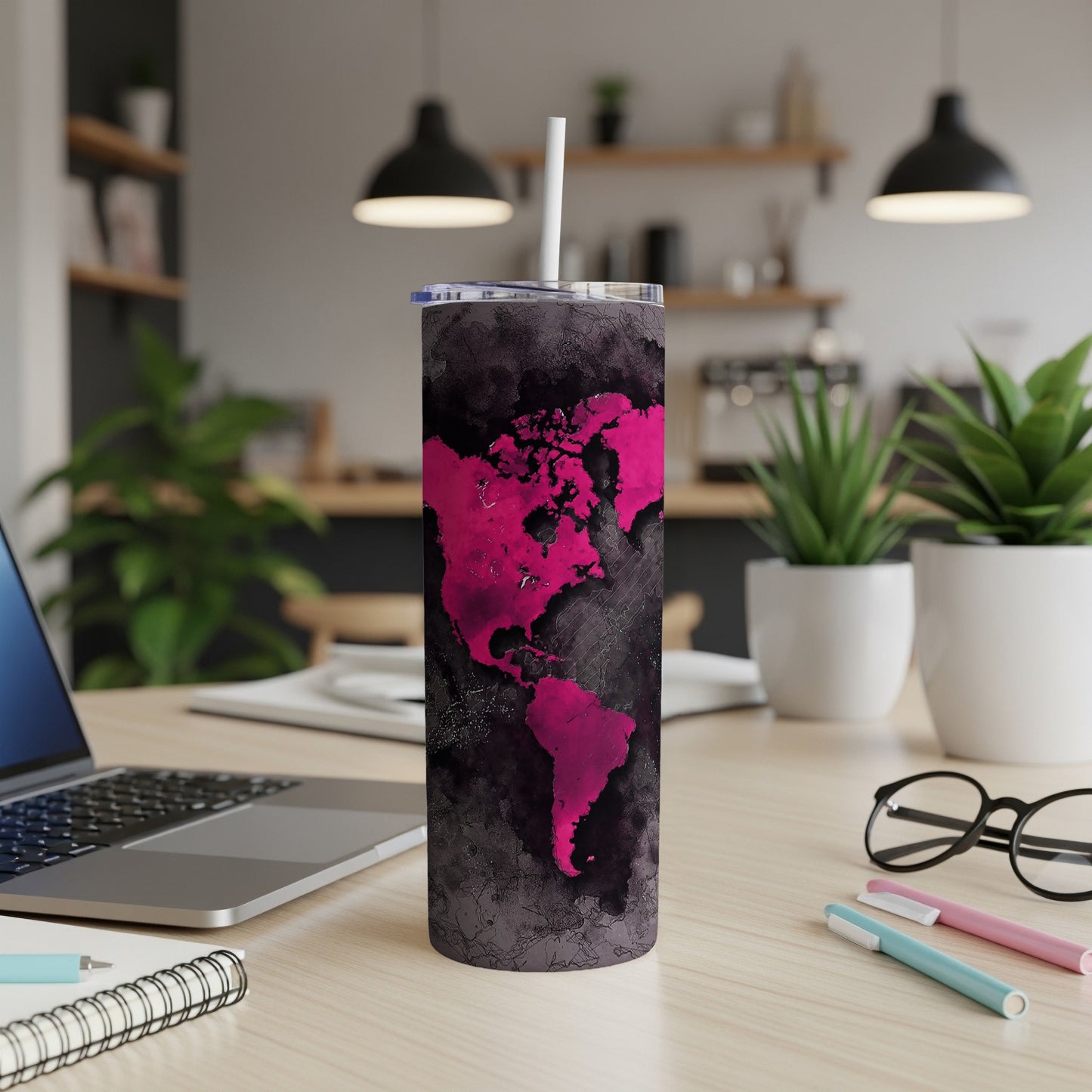 Tumbler with distressed dark background and hot pink map of North and South America.