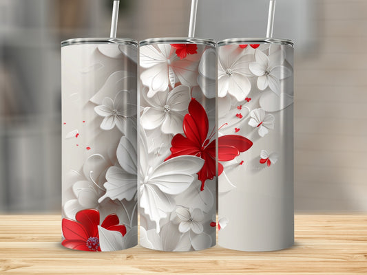 Three tumblers with a white and red floral and butterfly design.