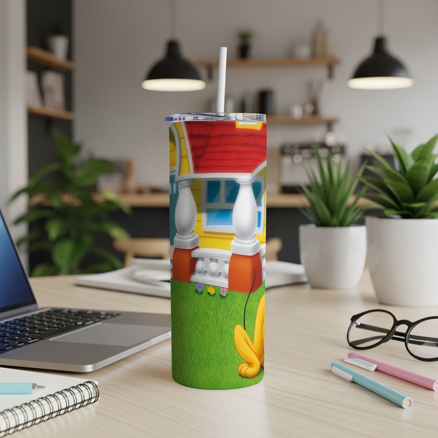 Yellow dog with red roof house and green grass design on a tumbler.