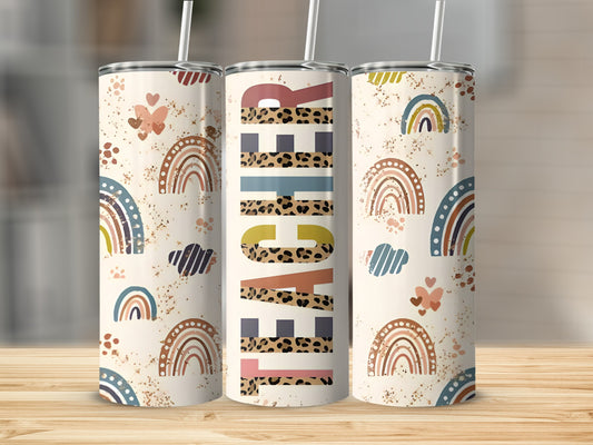 Teacher tumbler with rainbow and leopard print designs.