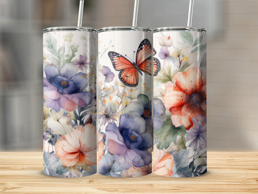 Three tumblers with watercolor floral patterns and a butterfly.