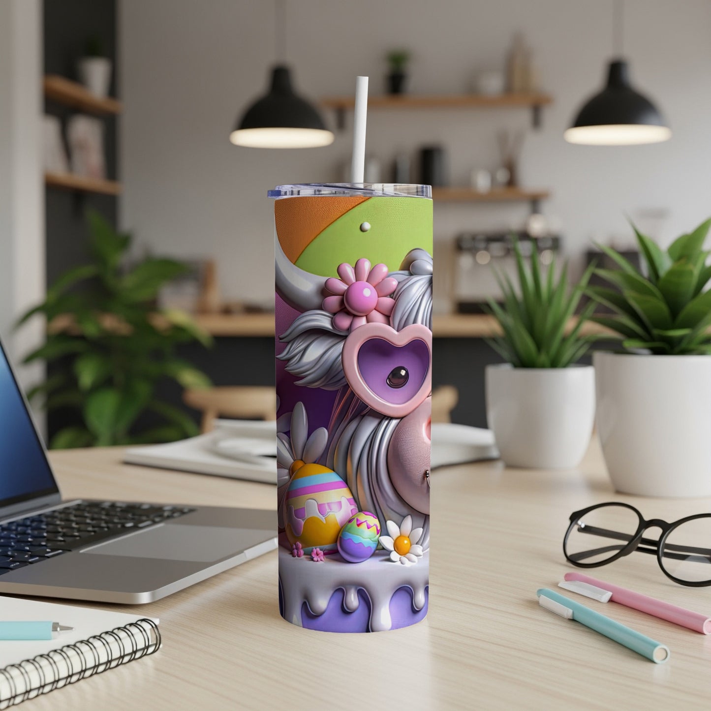 Easter egg tumbler with colorful abstract design and pastel flowers.