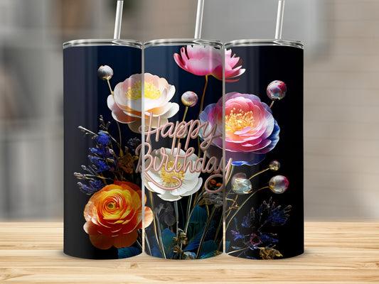 Happy Birthday tumbler with vibrant flowers on a dark background.