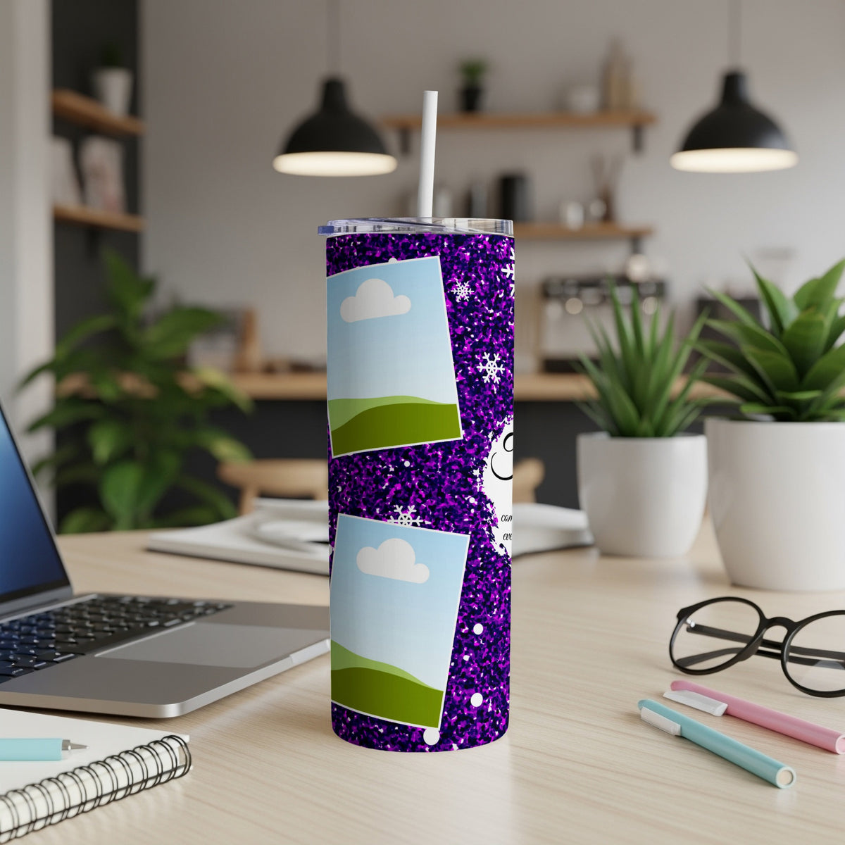 Purple glitter tumbler with photos, snowflakes, and text on a desk.