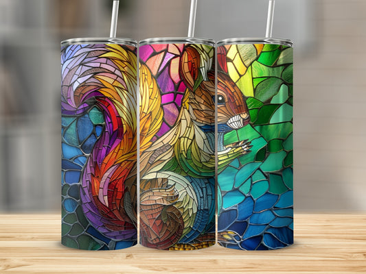 Stained glass squirrel design on a tall, cylindrical tumbler.