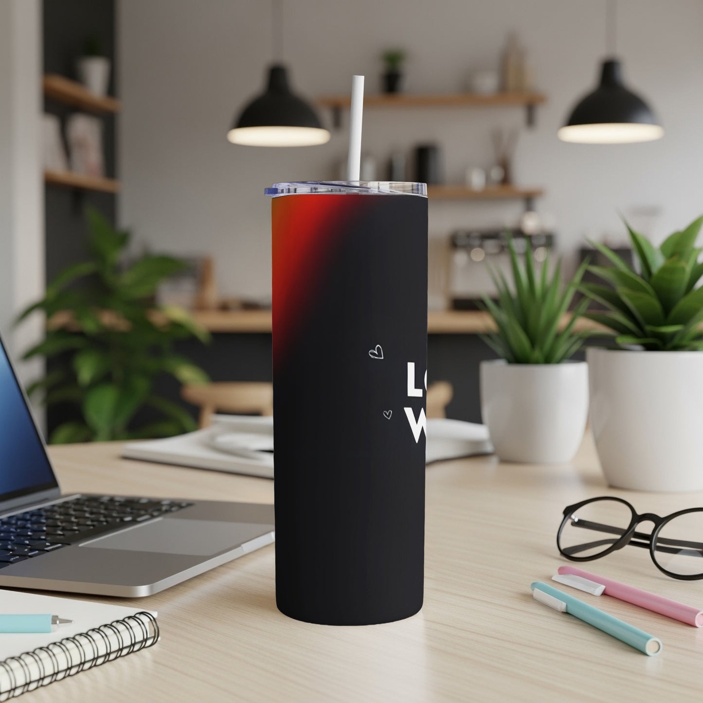 Black tumbler with red gradient top, text "Love."
