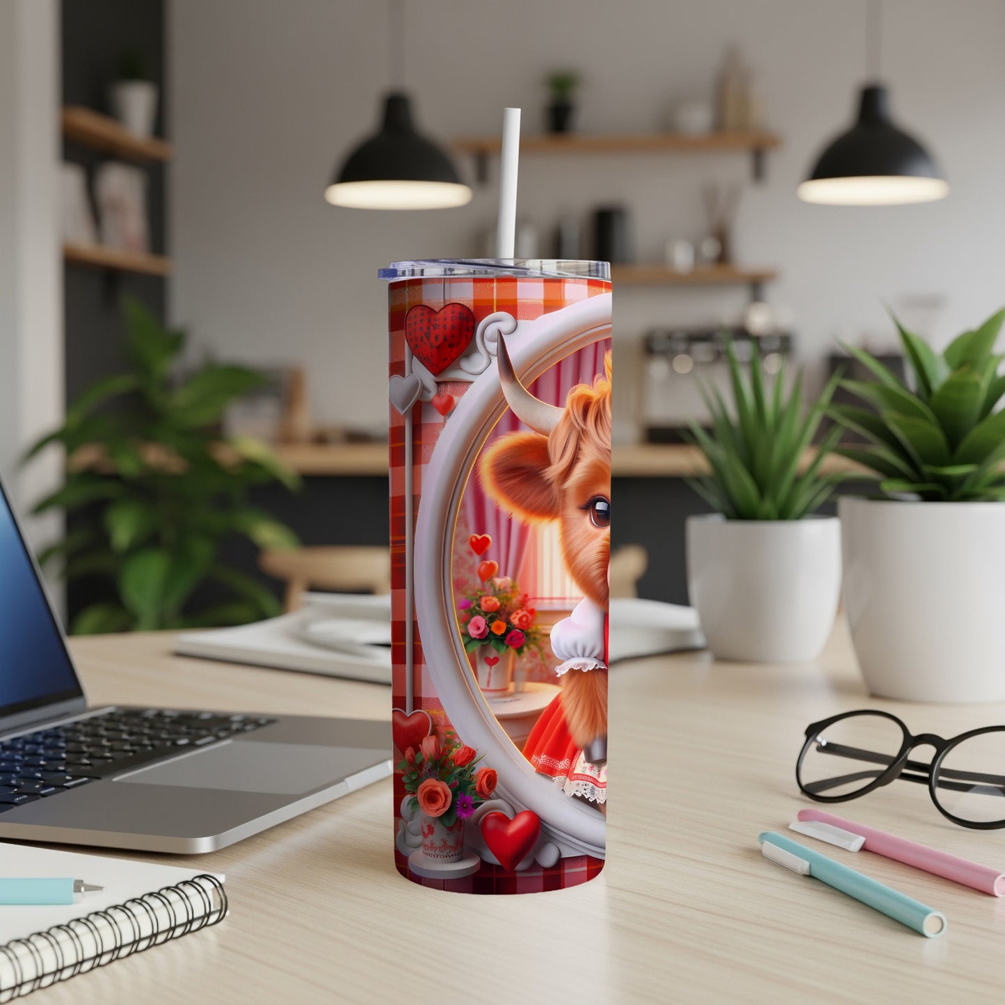 Cow with hearts and flowers on a red plaid patterned tumbler.