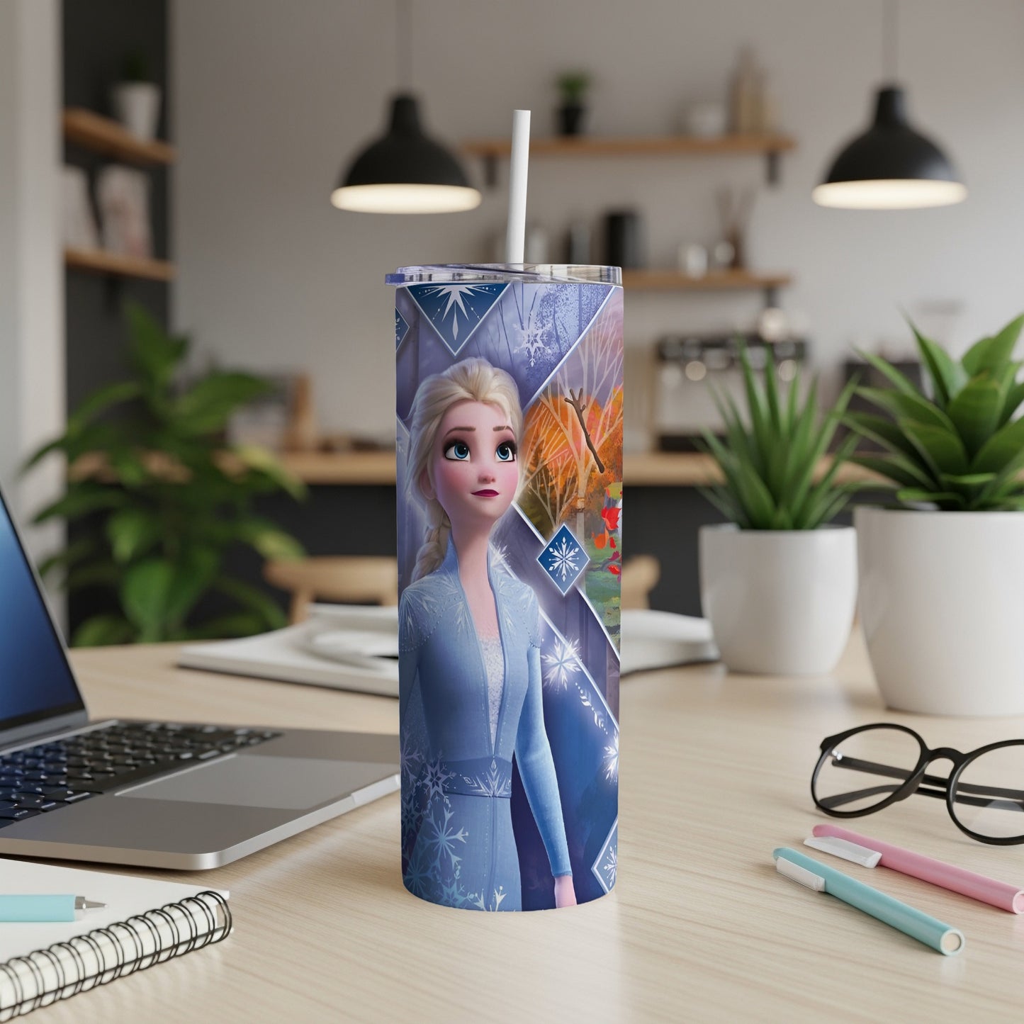 Frozen Elsa with snowflake pattern on a white tumbler.
