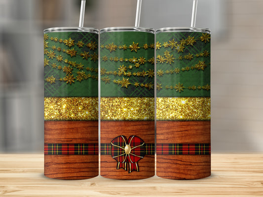 Green plaid tumbler with snowflakes, glitter, and a red plaid bow.