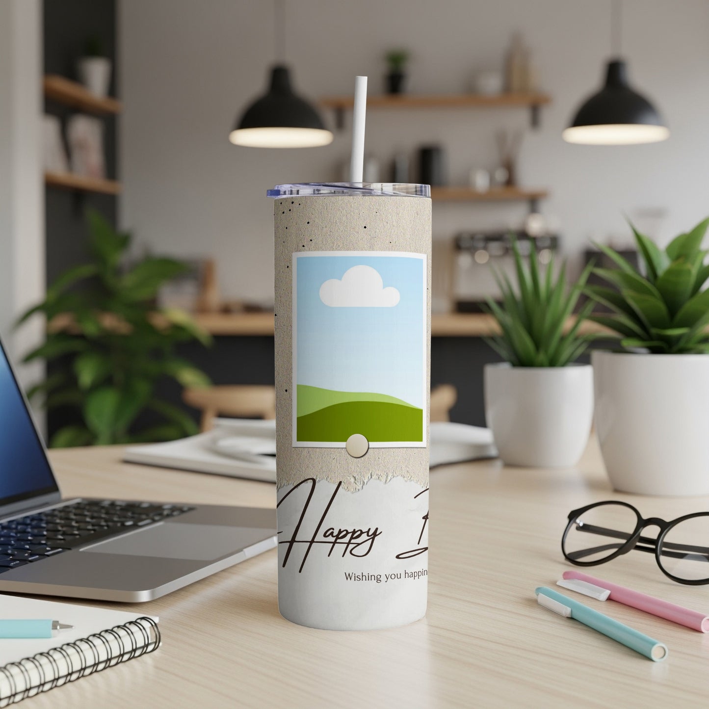 Concrete tumbler with "Happy 1st" text, a landscape photo, and a straw.