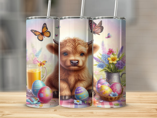 Highland calf with Easter eggs and butterflies on a tumbler.