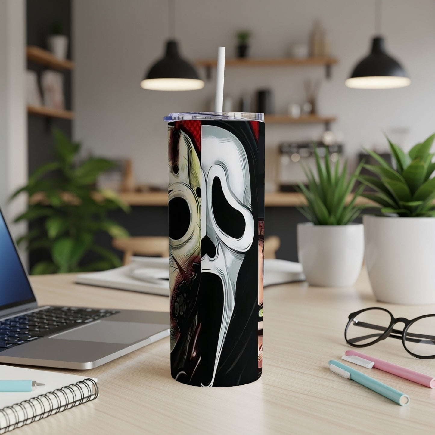 Tumbler with a split design featuring horror masks, including Ghostface and Leatherface.