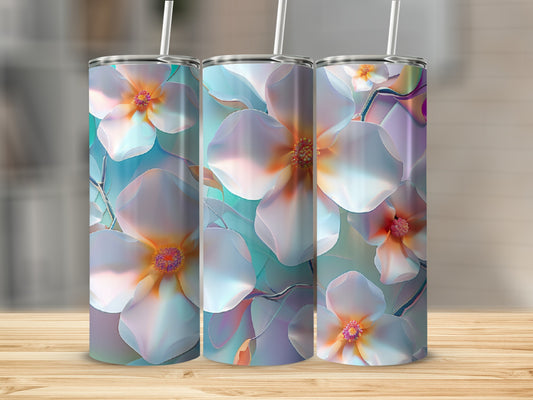 Three tumblers with a watercolor floral design featuring white and pink magnolias.
