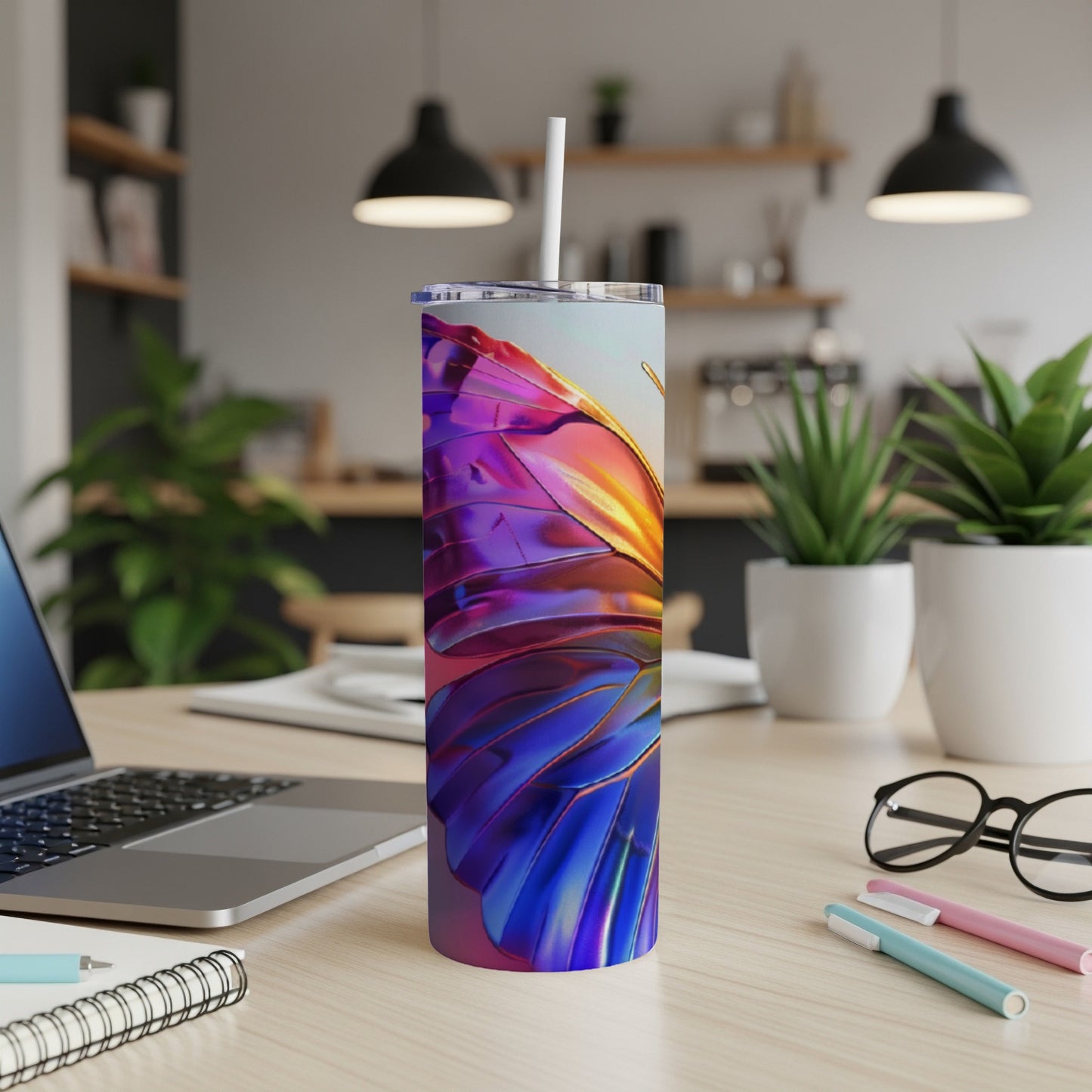 Slim tumbler with iridescent butterfly wing design.