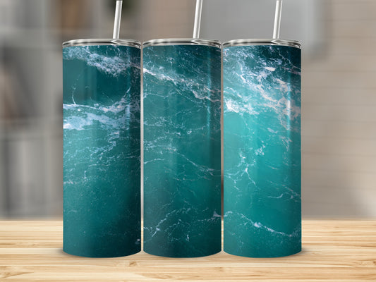 Three tumblers with a swirling ocean wave pattern.