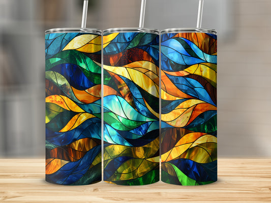 Three tumblers with a stained glass wave pattern in blue, green, and orange.