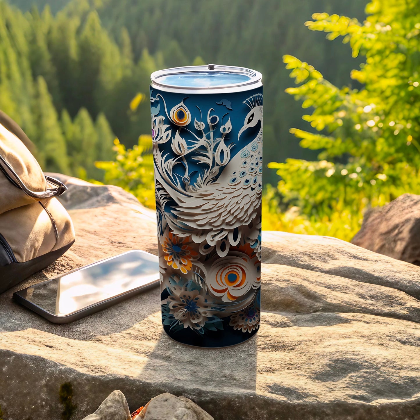 Dark blue tumbler with a detailed white peacock and floral design.