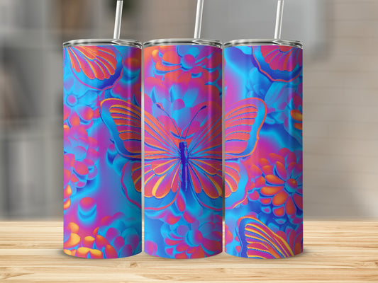 Three tumblers with neon butterfly and floral designs on a wooden surface.