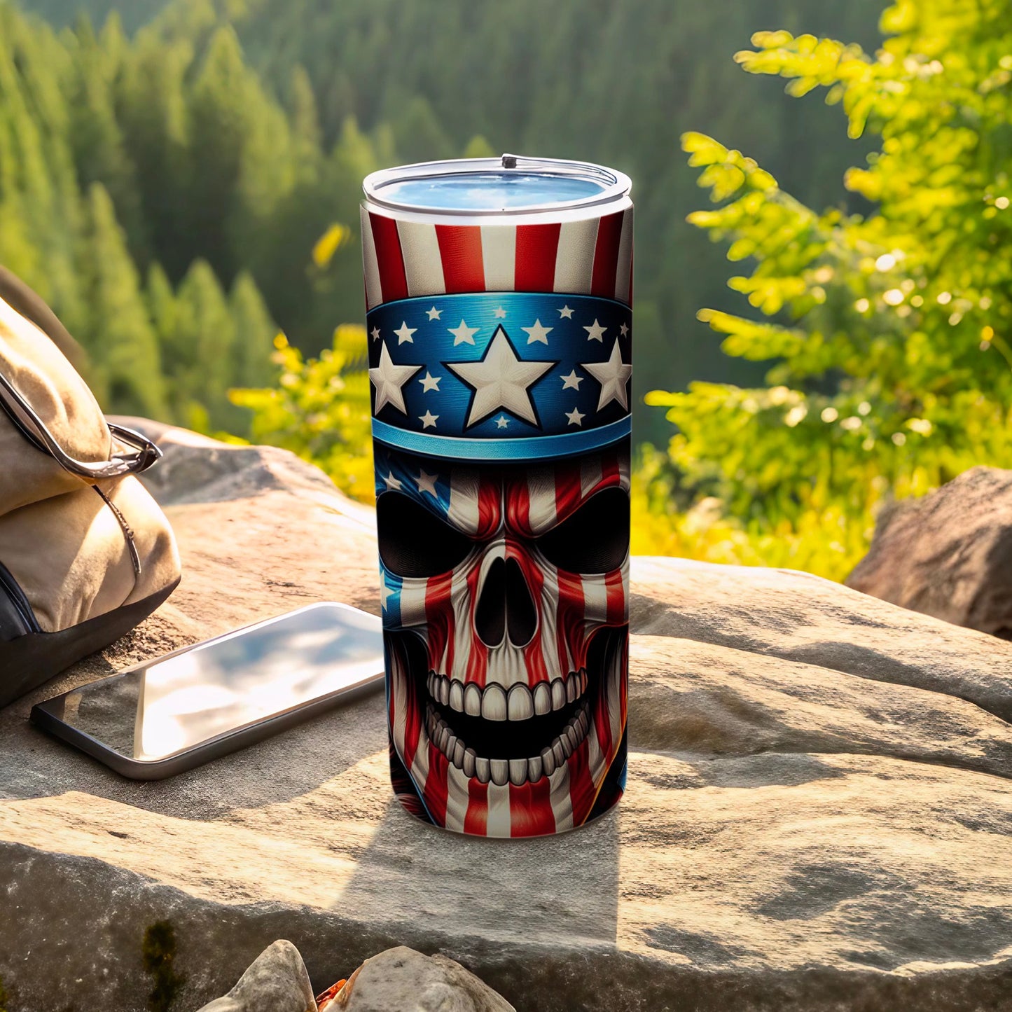 Patriotic skull tumbler with stars and stripes, on rocks outdoors.