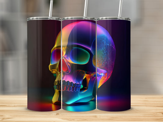 Three iridescent tumblers with colorful skull designs displayed on a wooden surface.