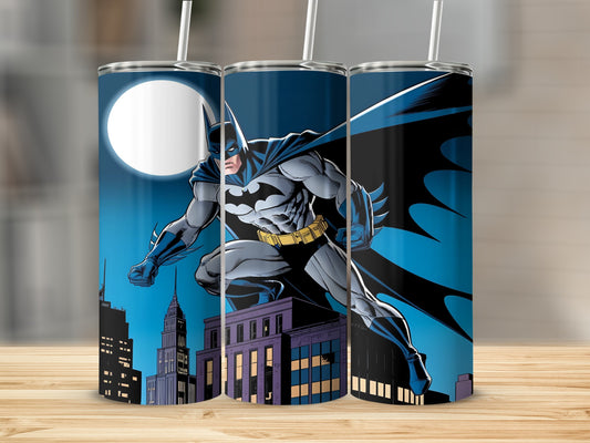 Batman on a rooftop at night with city buildings and a full moon.