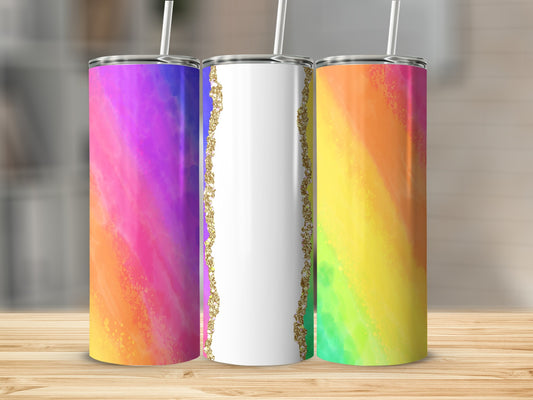 Three tumblers with watercolor designs and a white center tumbler with gold trim.
