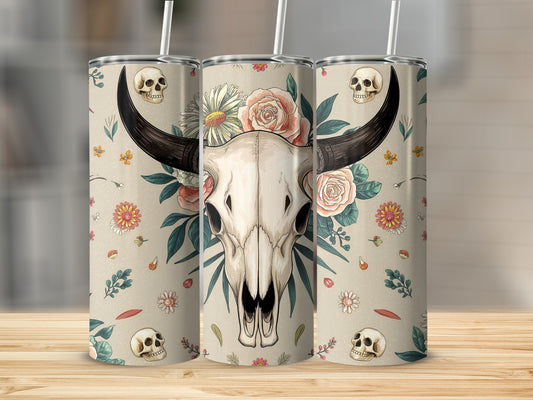 Tapestry-style tumbler with bull skull, flowers, and small skulls.