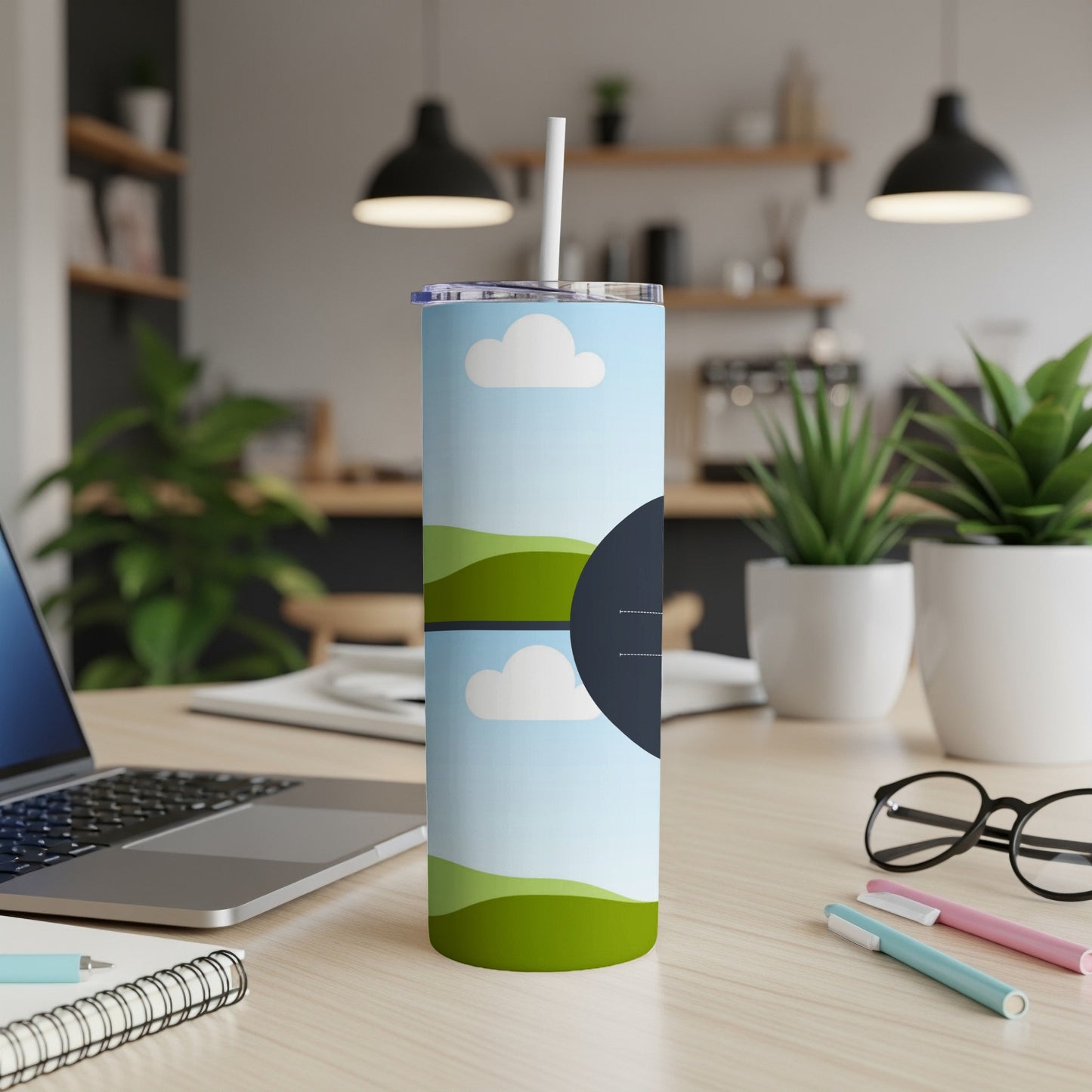 Tall tumbler with clouds and rolling green hills design.
