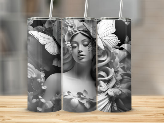 Black and white tumbler with woman and butterfly floral design.
