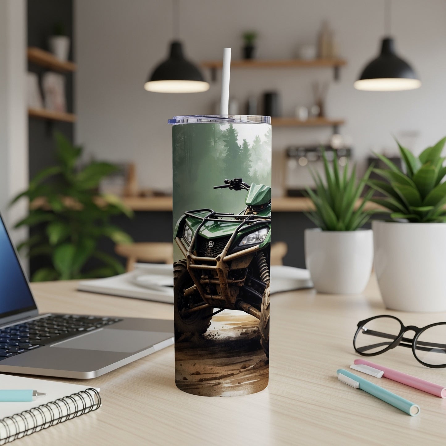 Green ATV on a muddy trail, printed on a travel tumbler.
