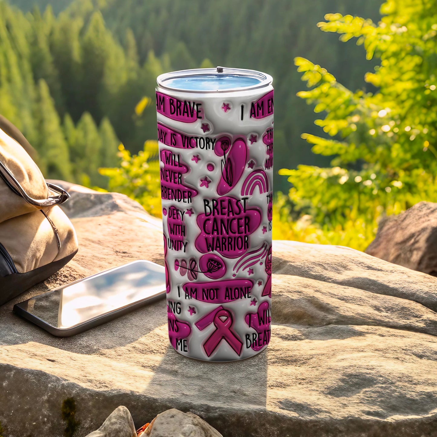 Pink breast cancer awareness tumbler with motivational text.