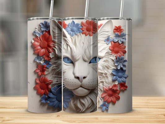 White cat face with blue and red flowers on a tumbler.