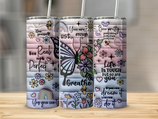 Pink and blue pastel tumbler with butterfly and inspirational quotes.