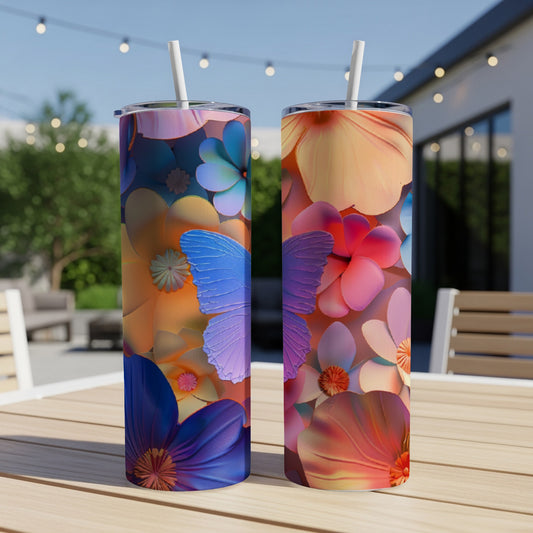 Two tumblers with floral and butterfly designs on a wooden table.
