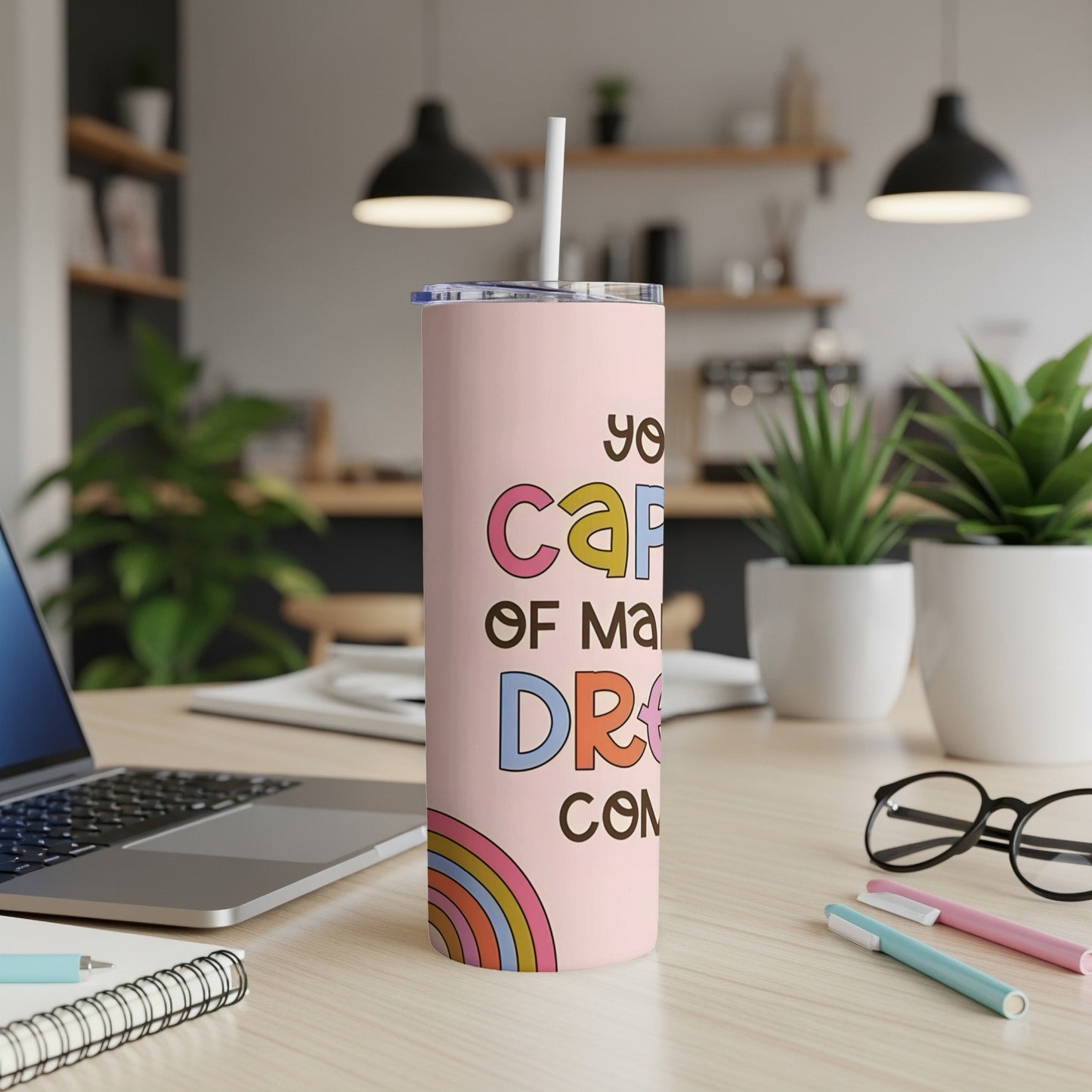 Pink tumbler with "you can do hard things" text and rainbow graphic.