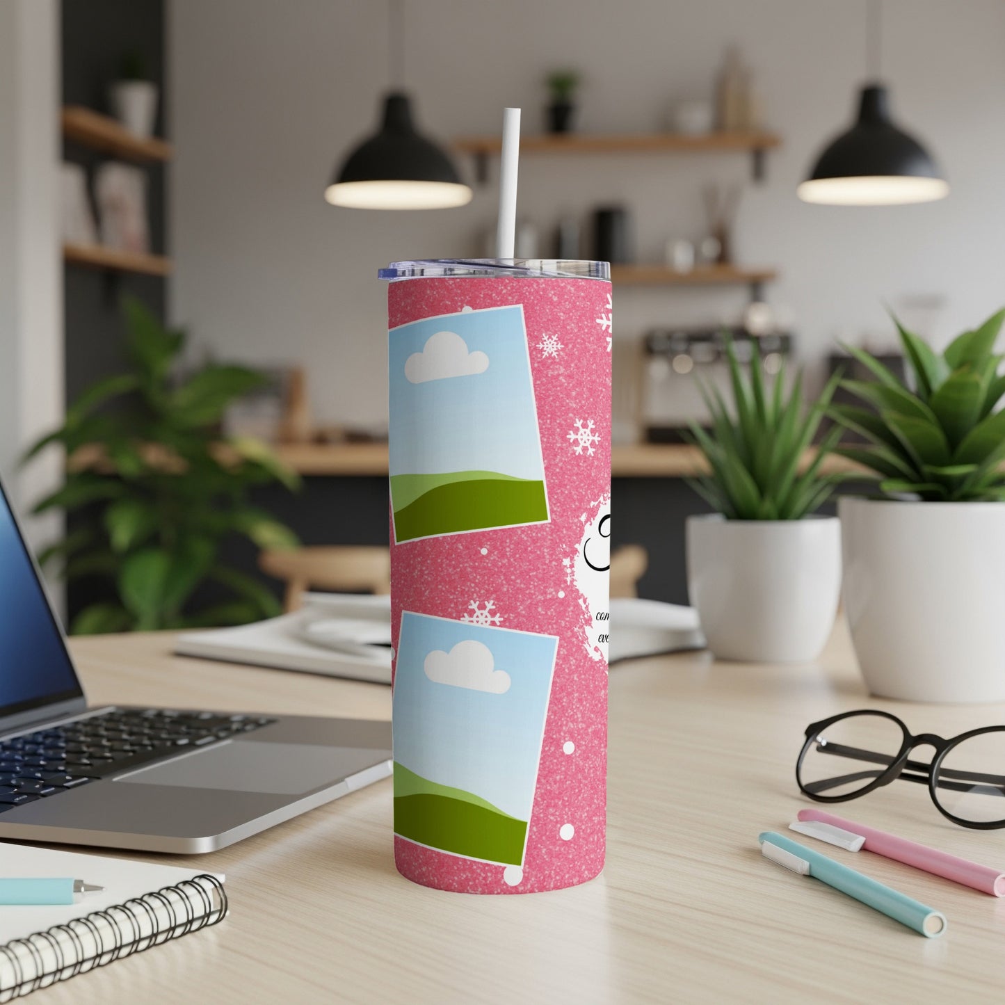 Pink glitter tumbler with two photo frames and snowflakes.